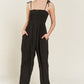 SMOCKED TIE STRAP JUMPSUIT